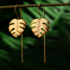 Boucles d'oreilles or feuilles monstres