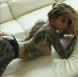 strings-culottes-collant femme blonde tatouée
